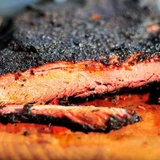 Slow-smoked beef brisket with a rich BBQ bark