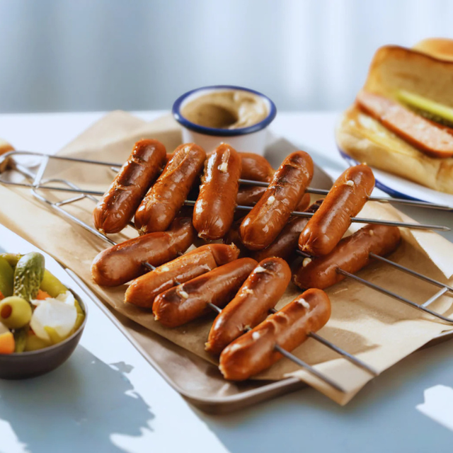 Grilled cocktail cheese Kransky sausages on skewers