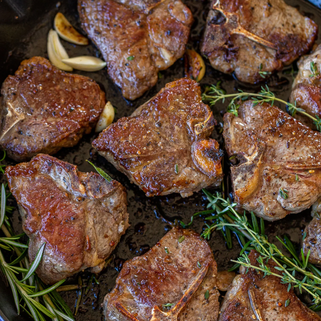 Grilled lamb loin chops with fresh rosemary and herbs