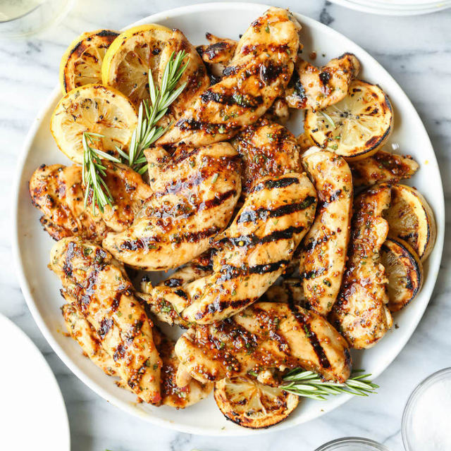 Grilled lemon garlic chicken with charred lemon slices